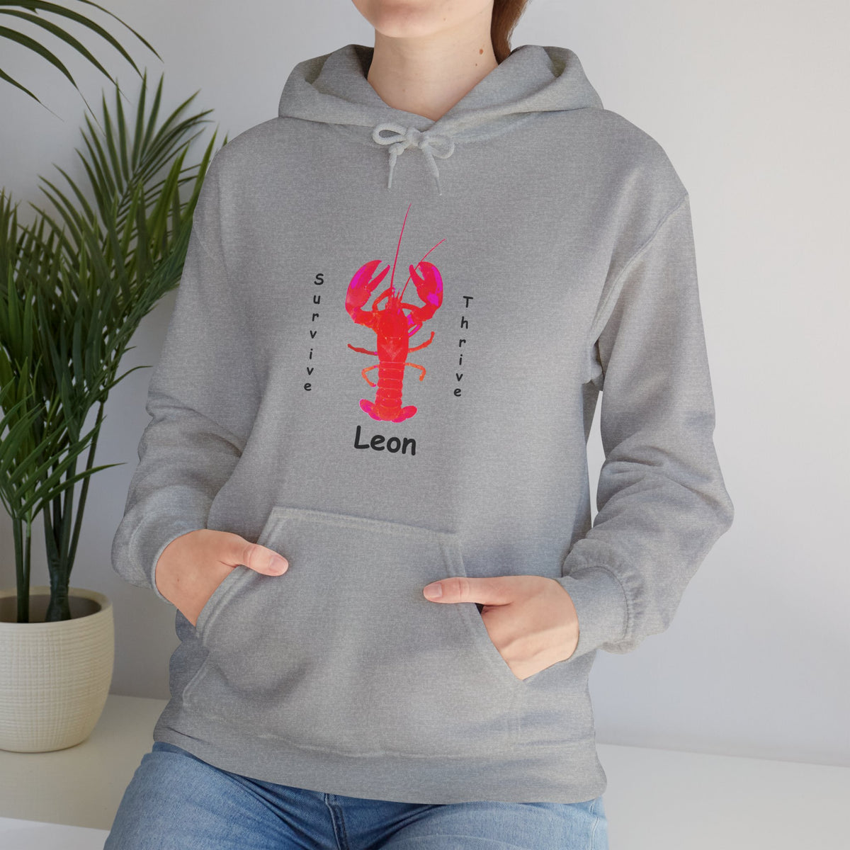 Unisex Heavy Blend™ Hooded Sweatshirt.  The art is from an actual photo of Leon, complete with his trademark back patch,... survive, thrive,...