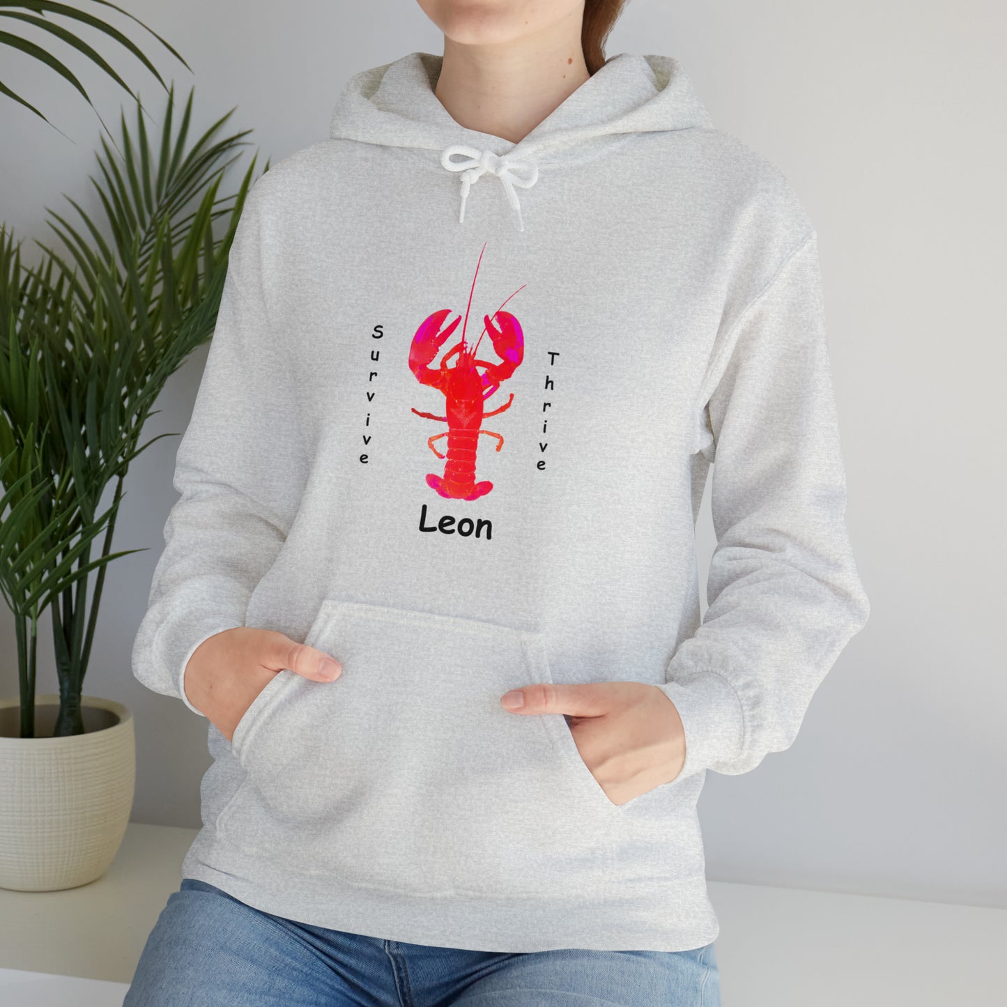 Unisex Heavy Blend™ Hooded Sweatshirt.  The art is from an actual photo of Leon, complete with his trademark back patch,... survive, thrive,...