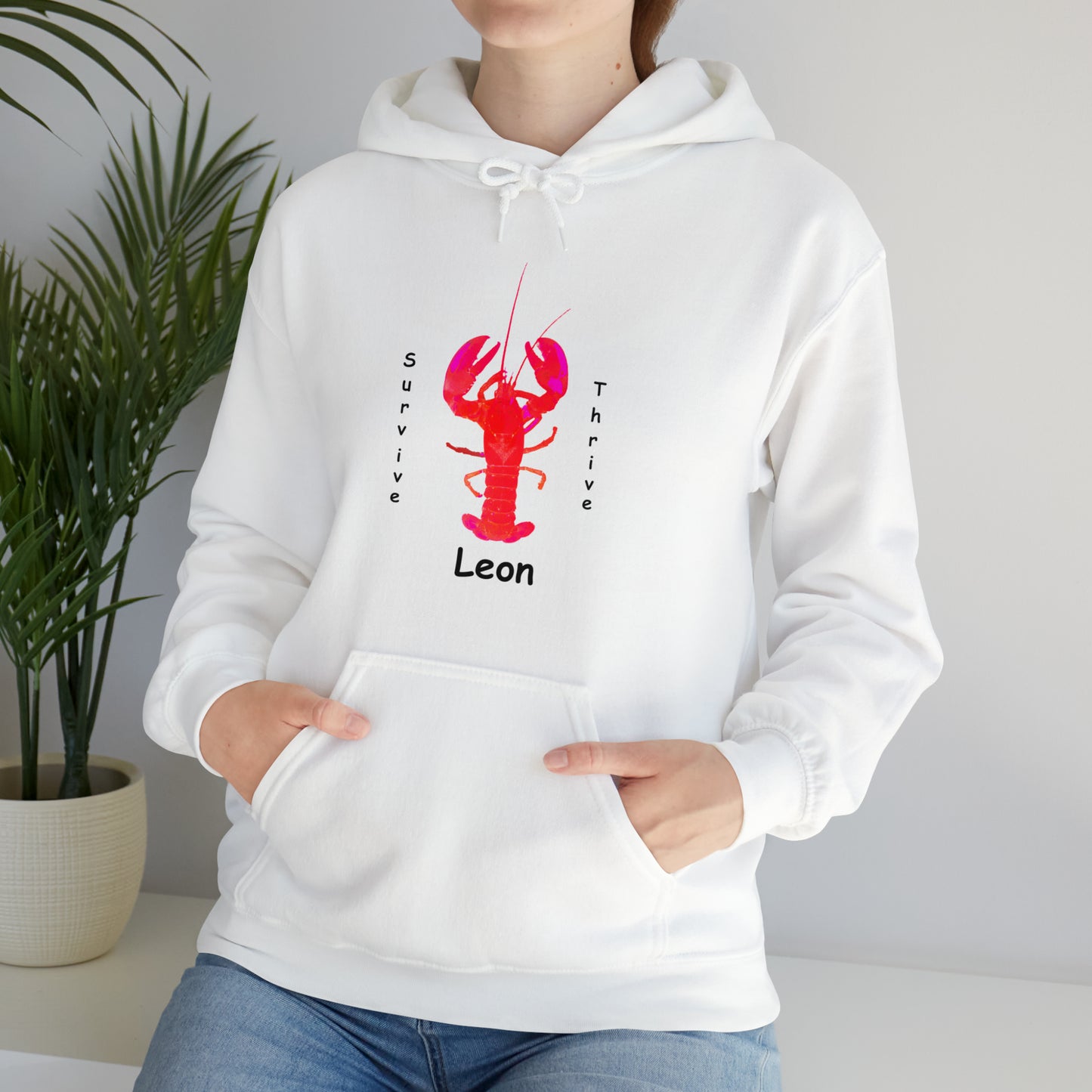 Unisex Heavy Blend™ Hooded Sweatshirt.  The art is from an actual photo of Leon, complete with his trademark back patch,... survive, thrive,...